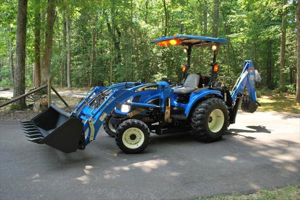traktor-new-holland-tc-33da-4x4-big-0